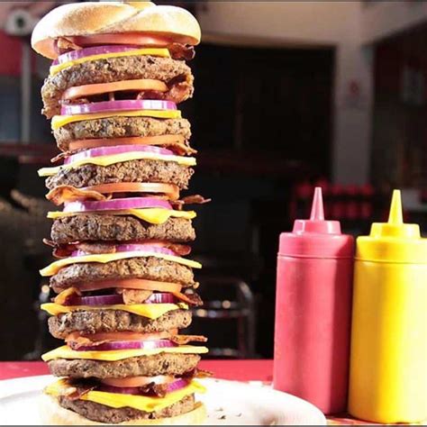 Heart attack grill But Heart Attack Grill’s main bill of fare is its burgers, ranging from its single patty and five-bacon strip covered Single Bypass Burger” to its completely insane Octuple Bypass Burger with eight patties and 40 bacon strips! It is this kind of cavalier attitude towards decadence that draws crowds to Heart Attack Grill